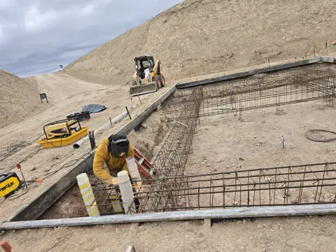 Foundation rebar being tied